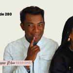 Natalie and Richard Lue standing together for episode 281 of The Baggage Reclaim Sessions