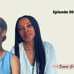 GG Renee Hill and Natalie Lue for The Baggage Reclaim Sessions. Two black women. GG Renee Hill wearing a sleeveless denim top with her hair scraped back in a bun. Natalie Lue with braided hair wearing a big-collared white shirt.